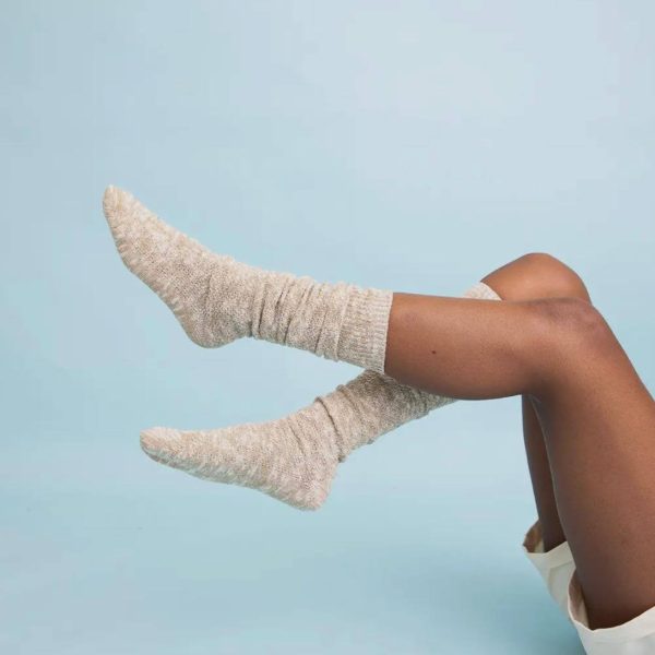 Perneira bege texturada