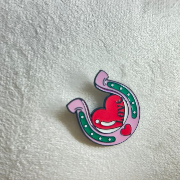 Alfinete “Catchy”